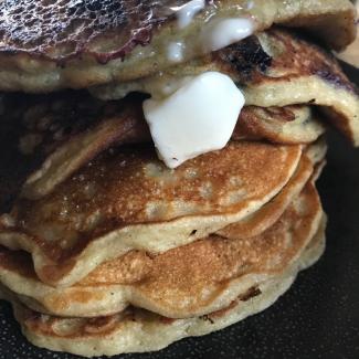 stack of amaranth pancakes with melting butter