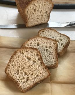 Open-crumb sourdough loaf